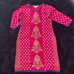 Elegant Pink Dress with Intricate Patterns